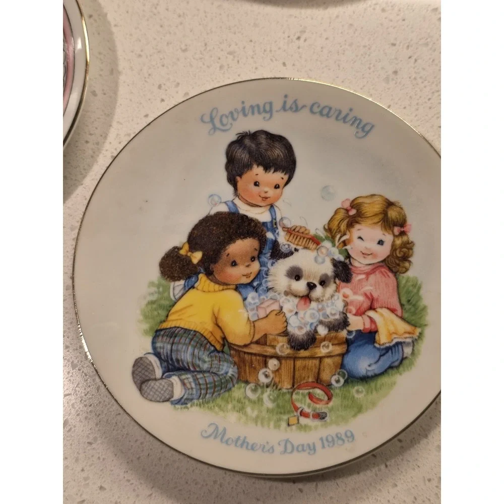 Set of 8 Avon Collectable Plates 1980s